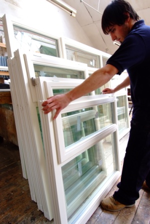 Warehouse team manufacturing windows