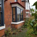 Square bay sash window colour matched to F&B 31 Railings