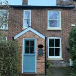 Timber windows and a blue stable door