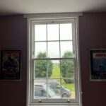 Sliding sash window with Georgian bars