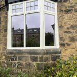 Splay bay window with high performance flush windows