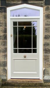 Timber door with an arched fanlight