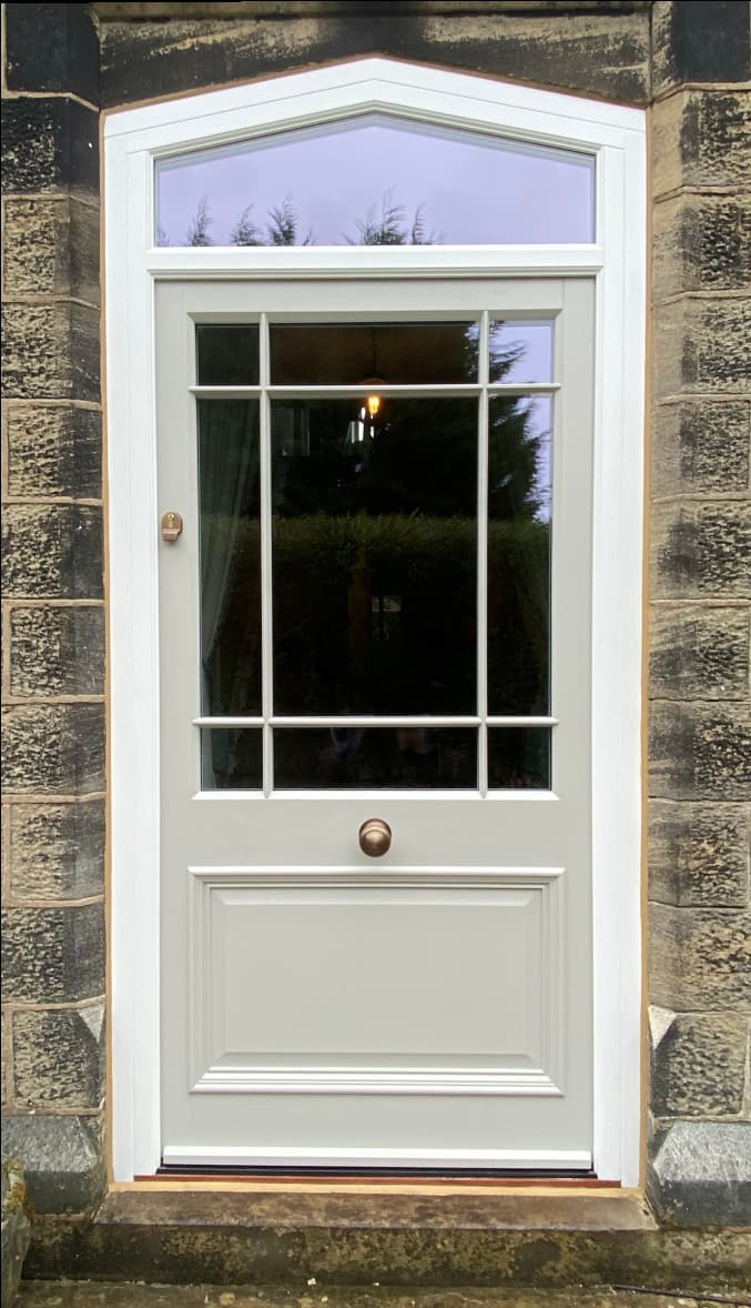 Timber door with an arched fanlight