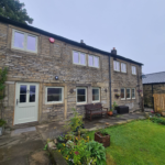 Barn conversion with timber casement window