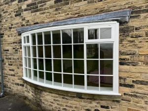 Bespoke bay window with curved glass