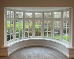 Curved bay window with Heritage Flush casement windows