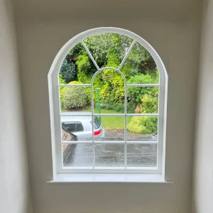 Bespoke arched window with shaped bars
