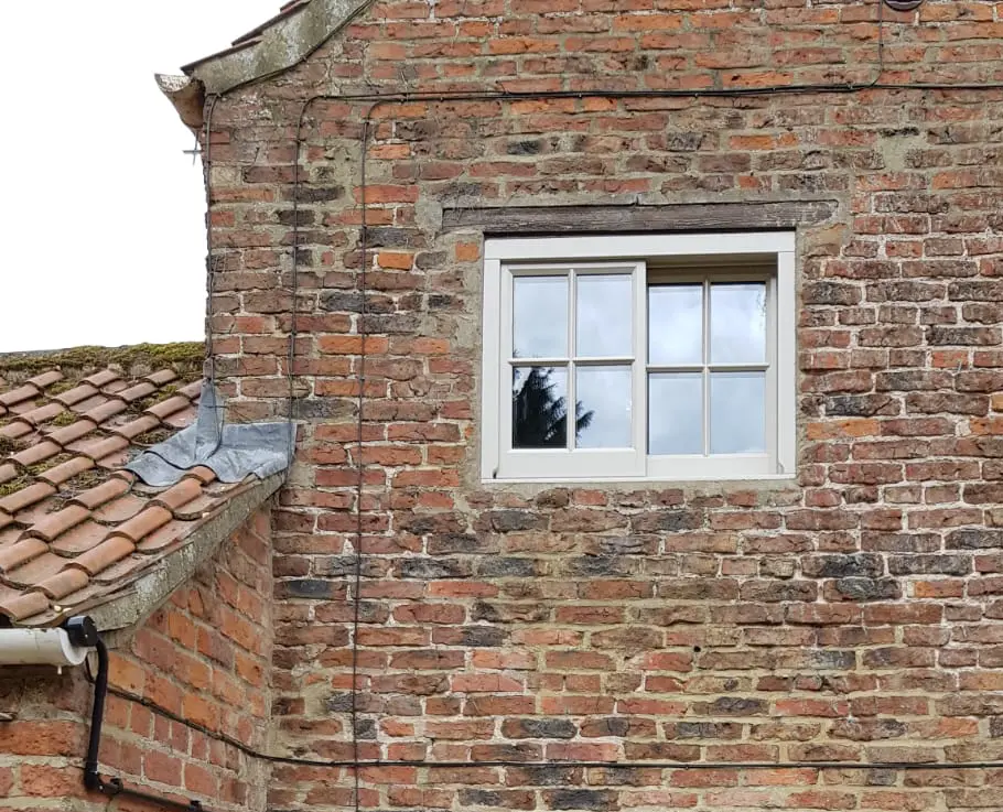 Timber Yorkshire slider in Elephants Breath in a red brick Yorkshire cottage