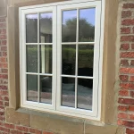 Timber flush casement window colour matched to Farrow & Ball Matchstick