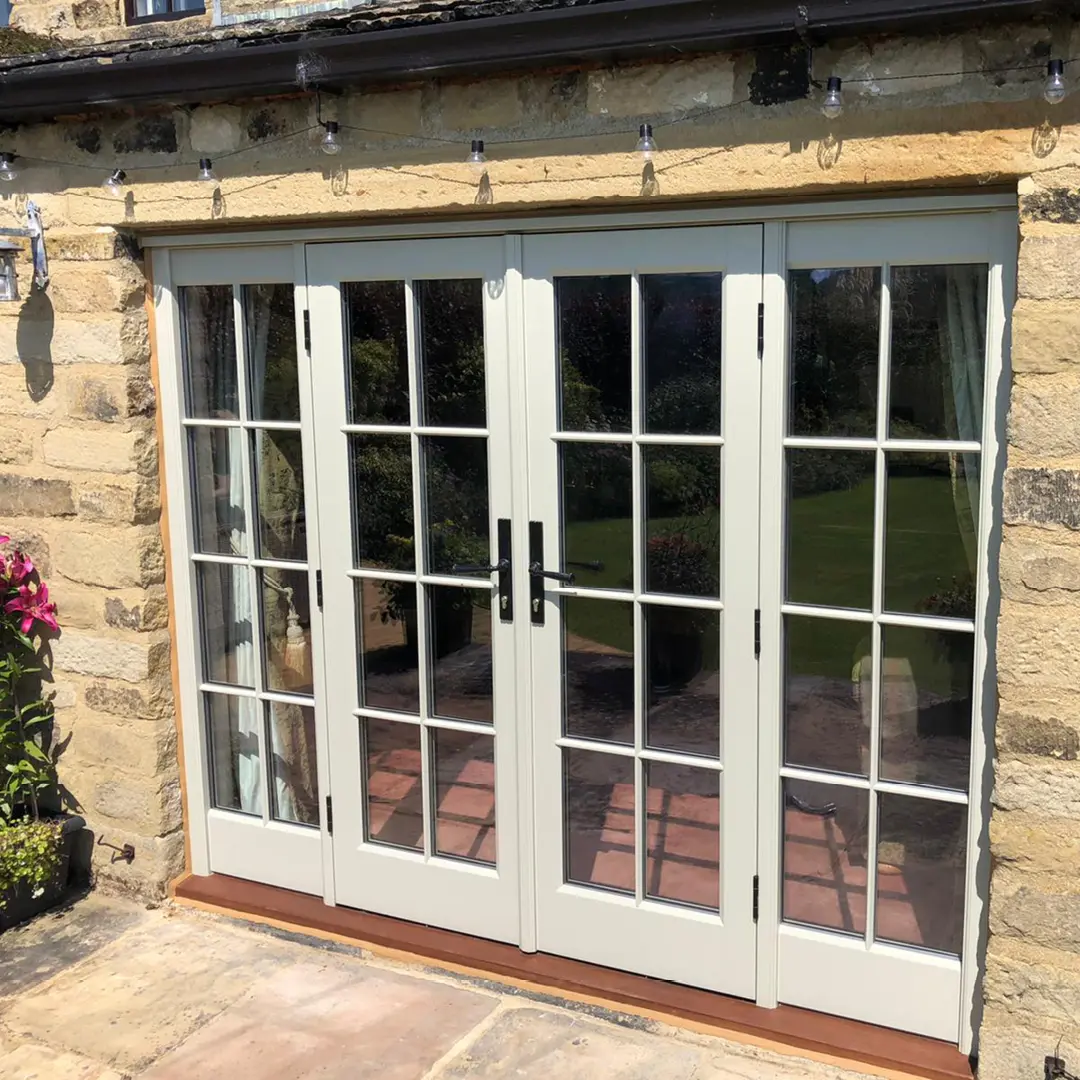 Double patio doors and screens with traditional hardware