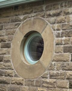Timber bullseye window 