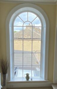 Replacement arched timber window