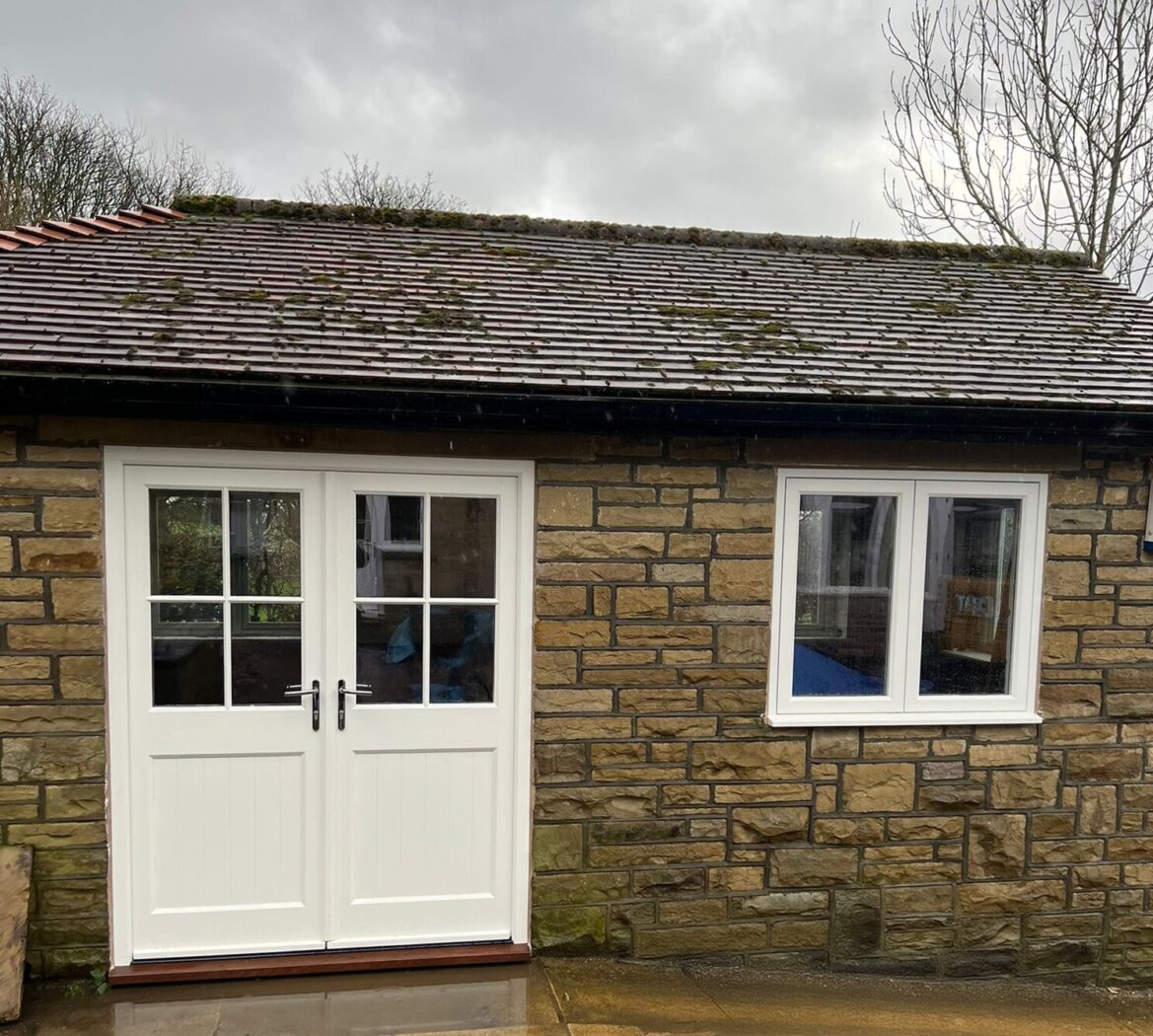 Cottage with wooden double patio doors