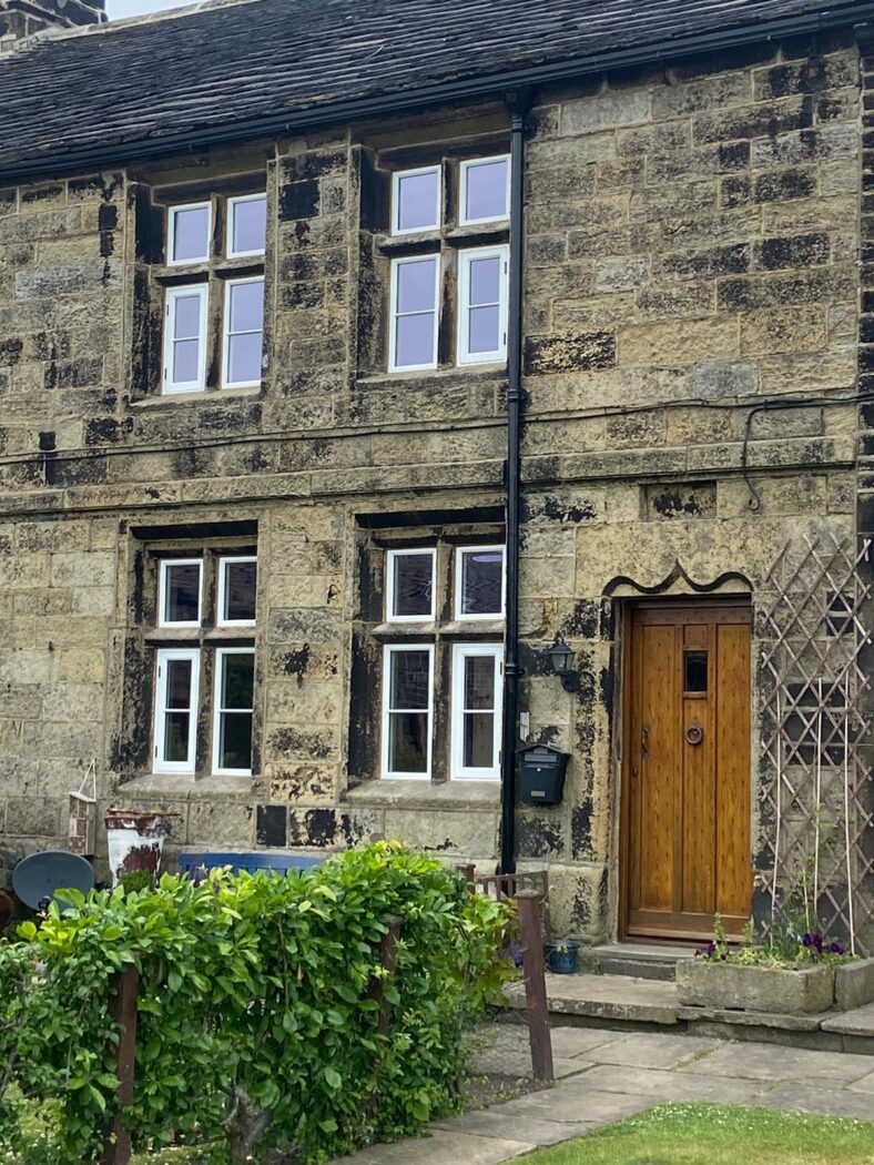 Historic building with white Heritage Flush casement windows