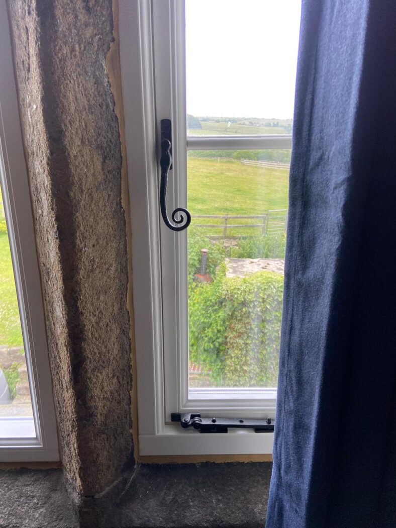 Timber Heritage Flush casement window with black iron monkey tail hardware