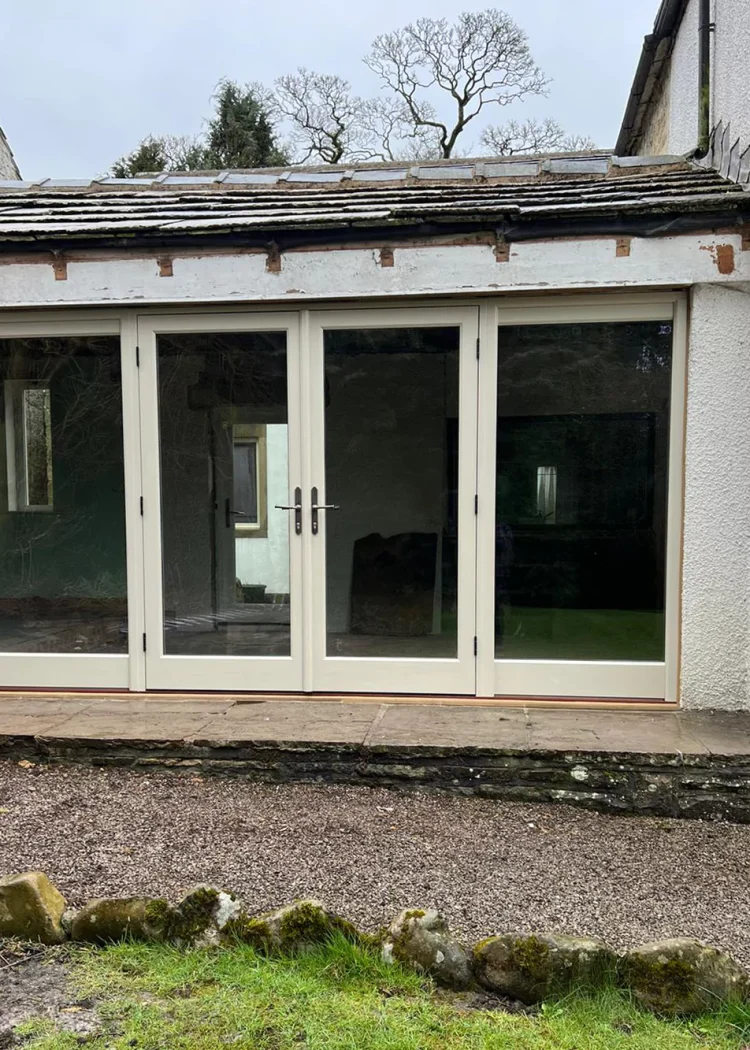 Accoya timber French doors and sidelights colour matched to Old White
