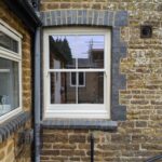 Sliding Sash window in Dulux Gardenia