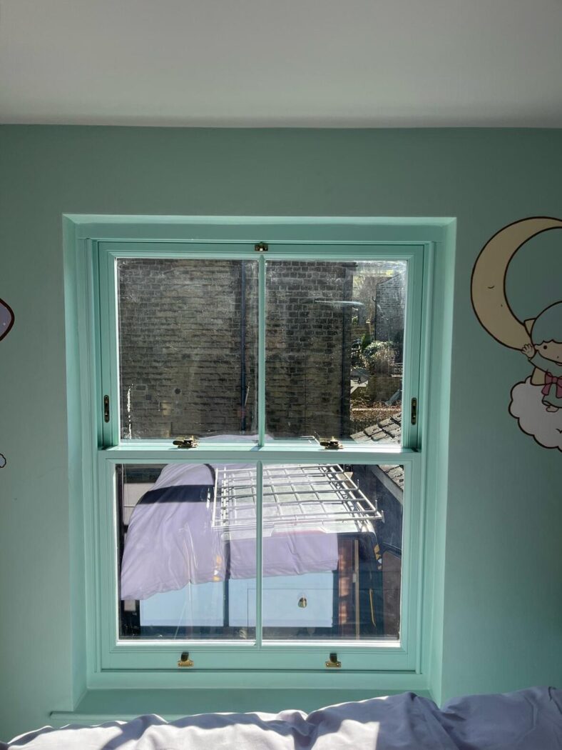 Sliding sash window in Dulux Silver Jade