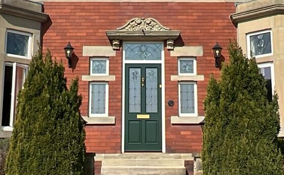 A Grand Accoya timber front door in a UK house