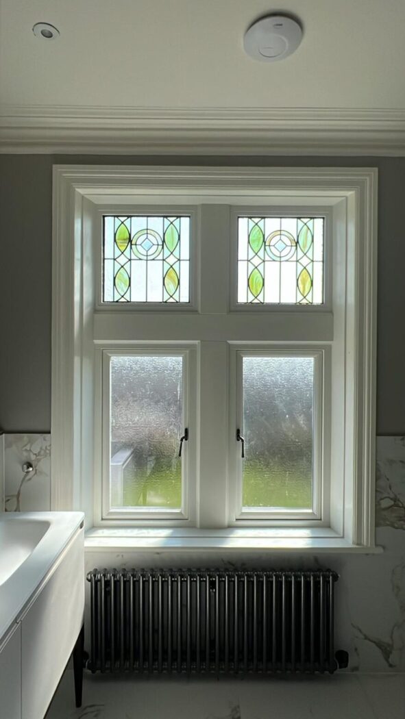 Bathroom casement windows with decorative art deco glass