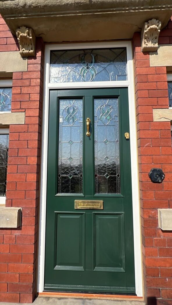 Bronze green Accoya door with decorative stained glass