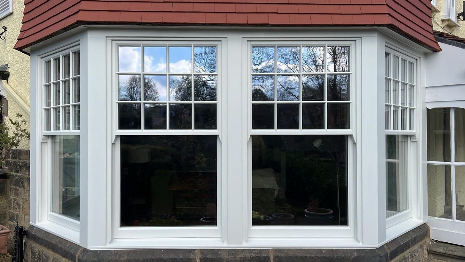 Timber bay window with internal beading