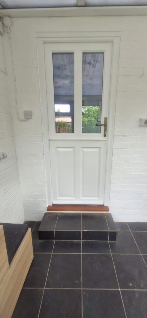White Accoya stable door with an Antique Nickel handle