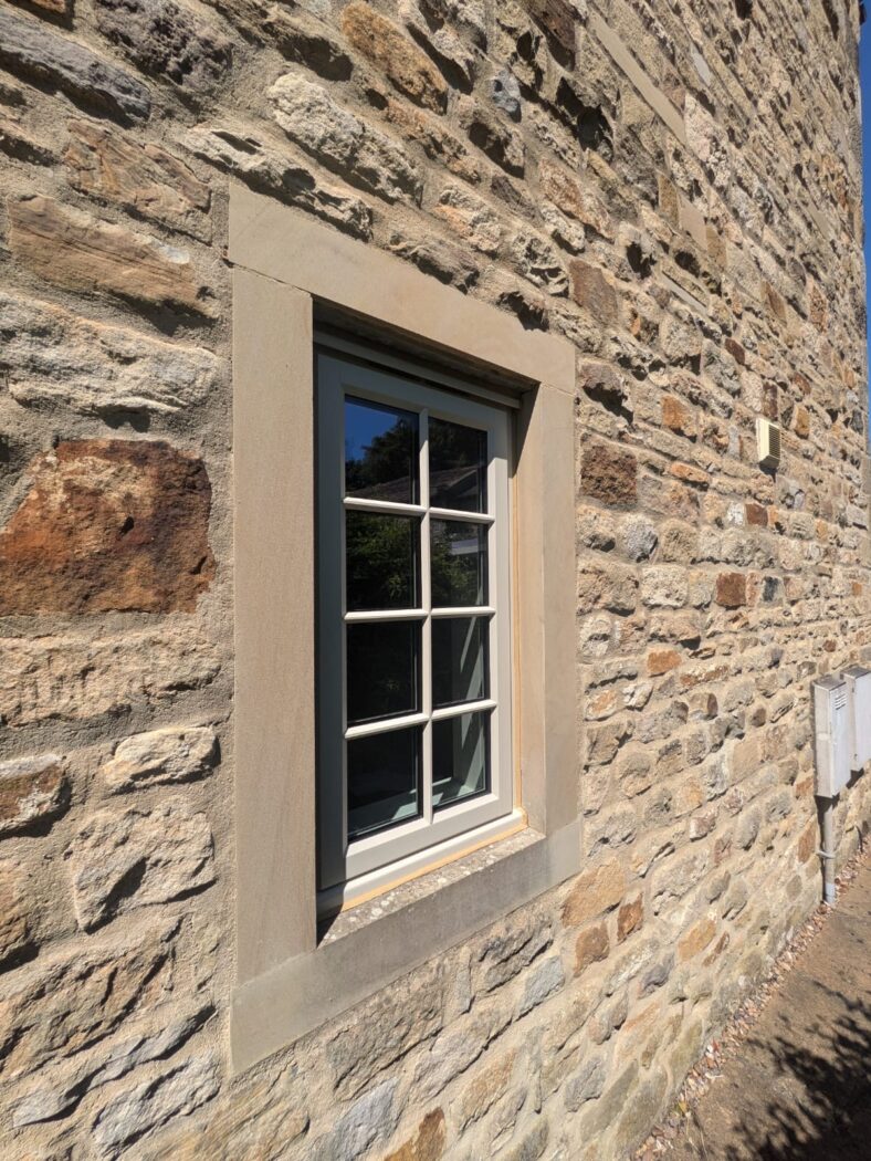 Stormproof casement window with Georgian bars