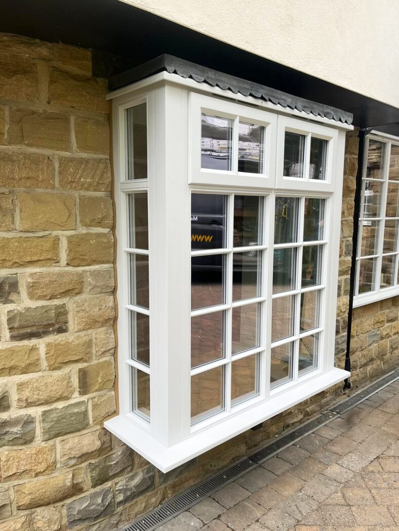 Square bay window with Georgian bars and stormproof casement windows