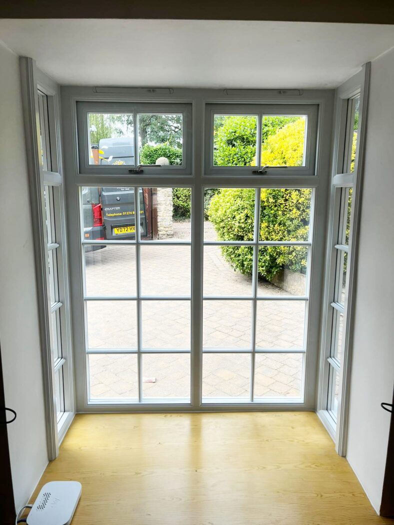 Interior view of a square bay window with Georgian bars