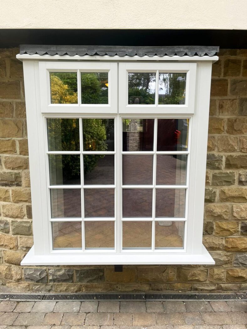Georgian style bay window with two stormproof hinged casement windows
