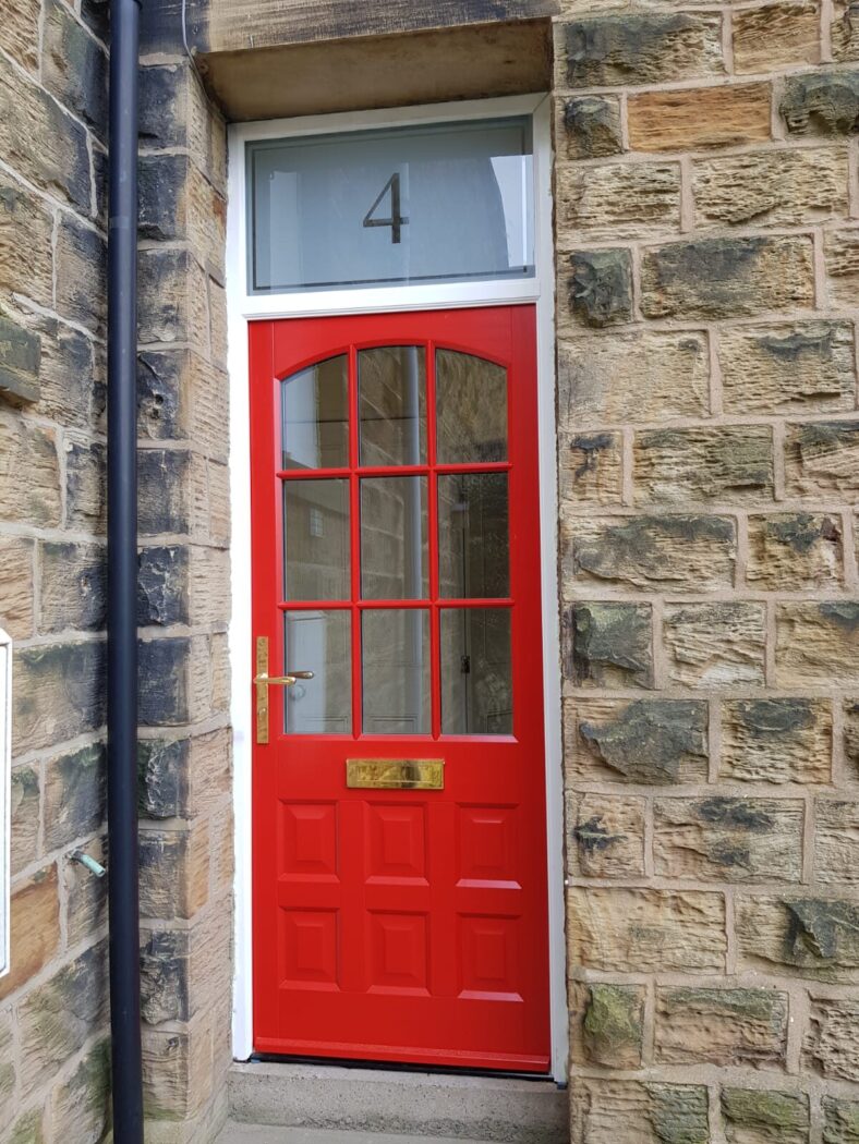 Rectory Red front door with a sandblasted fanlight