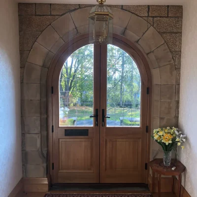 Arched timber double doors