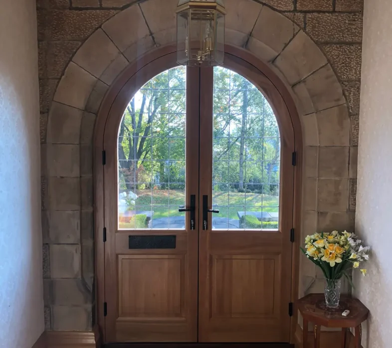 Arched timber double doors