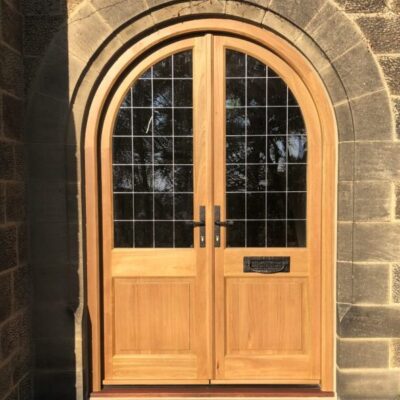 Timber stain arched double doors