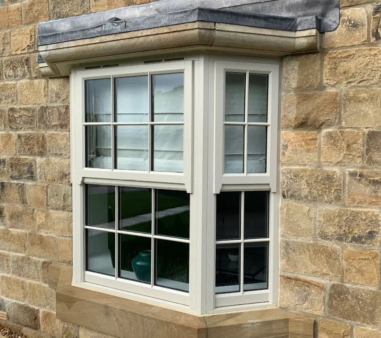 Splay bay window with timber mock sash windows