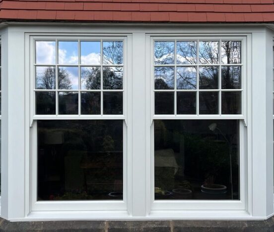 Timber bay window with internal beading